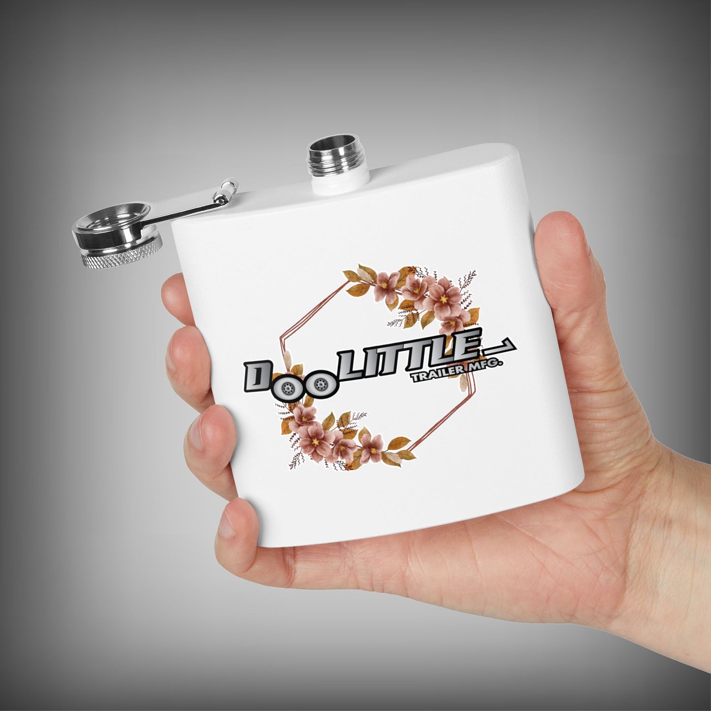 Hand holding the doolittle flask