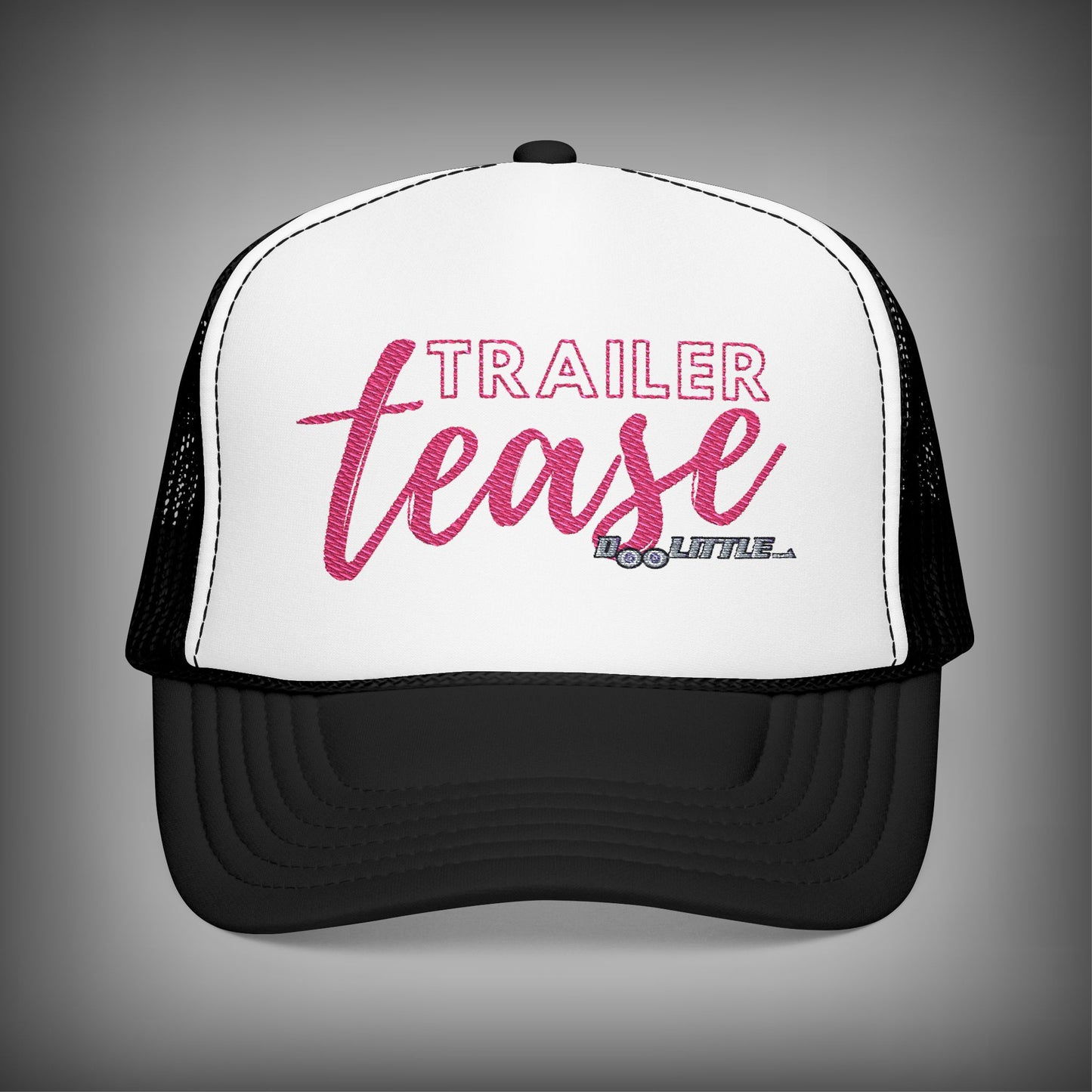 black and white pink trailer tease hat.