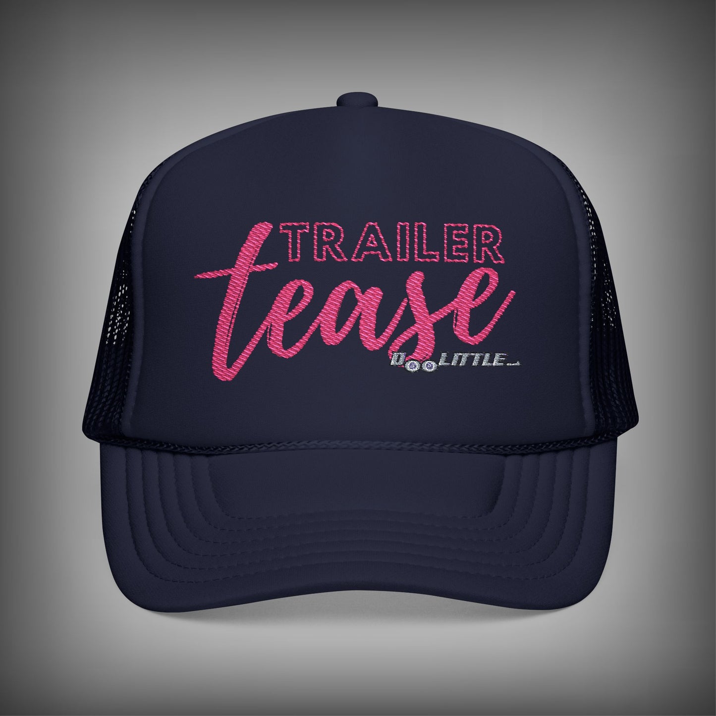 navy blue Trailer tease pink hat.