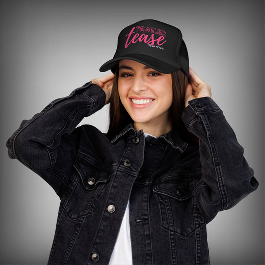 women wearing black and pink trailer tease hat