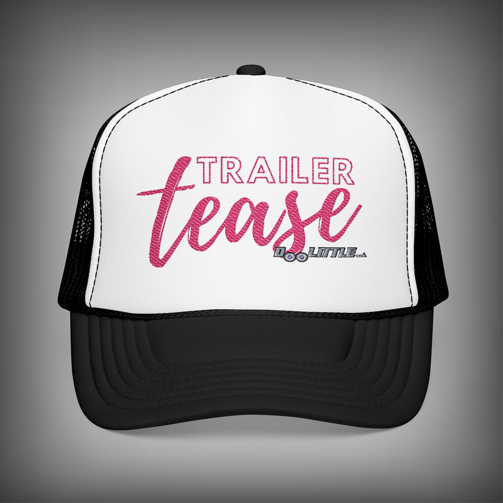 black and white pink trailer tease hat.